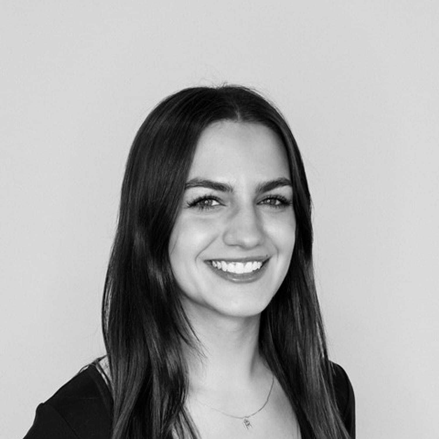 Portrait of Rylea, a professional stylist at CONFETTI CROWN. a salon+spa, showcasing their expertise and style.