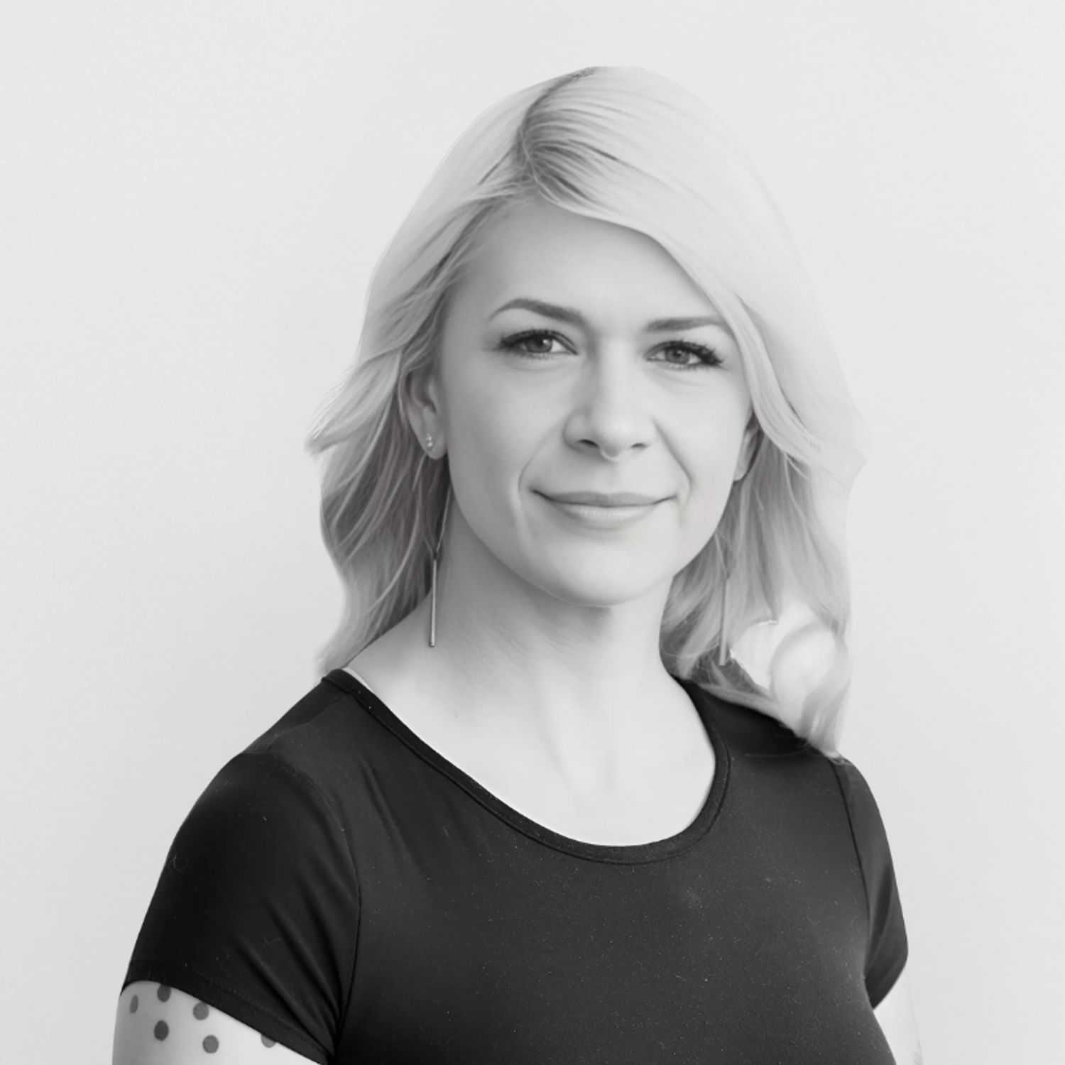 Portrait of Cassie, a professional stylist at CONFETTI CROWN. a salon+spa, showcasing their expertise and style.