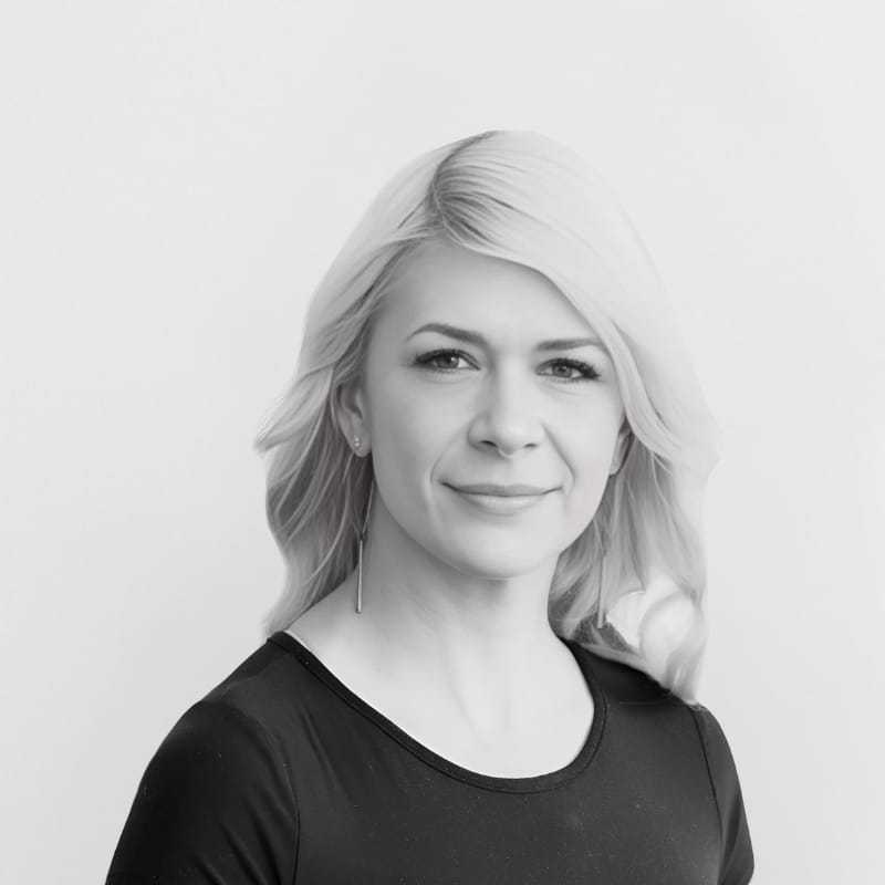 Portrait of Cassie, a professional stylist at CONFETTI CROWN. a salon+spa, showcasing their expertise and style.