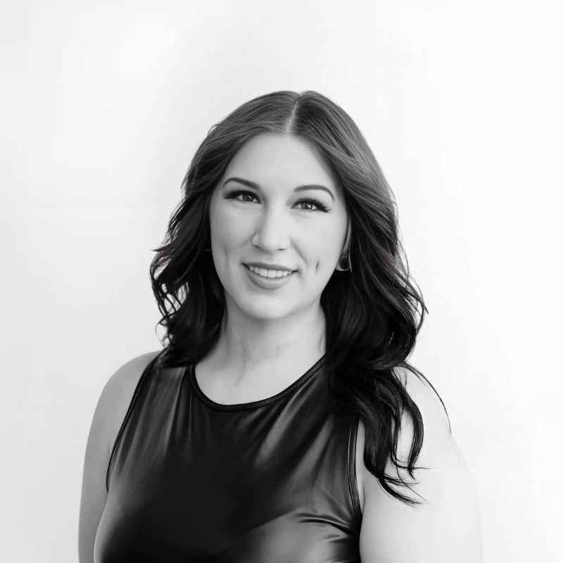 Portrait of Maddie, a professional stylist at CONFETTI CROWN. a salon+spa, showcasing their expertise and style.