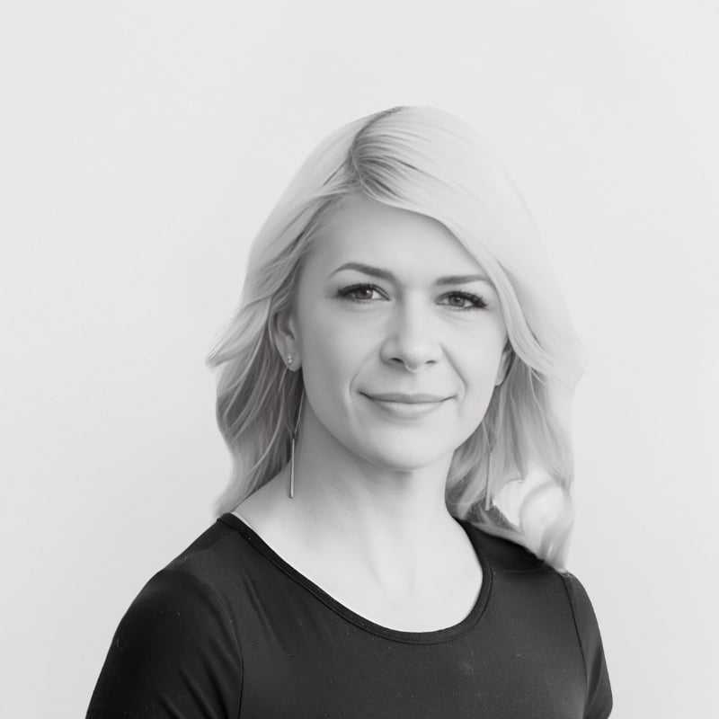 Portrait of Cassie, a professional stylist at CONFETTI CROWN. a salon+spa, showcasing their expertise and style.