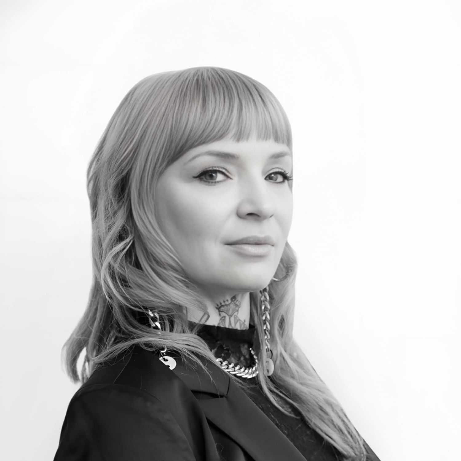 Portrait of Jocelyn, a professional stylist at CONFETTI CROWN. a salon+spa, showcasing their expertise and style.