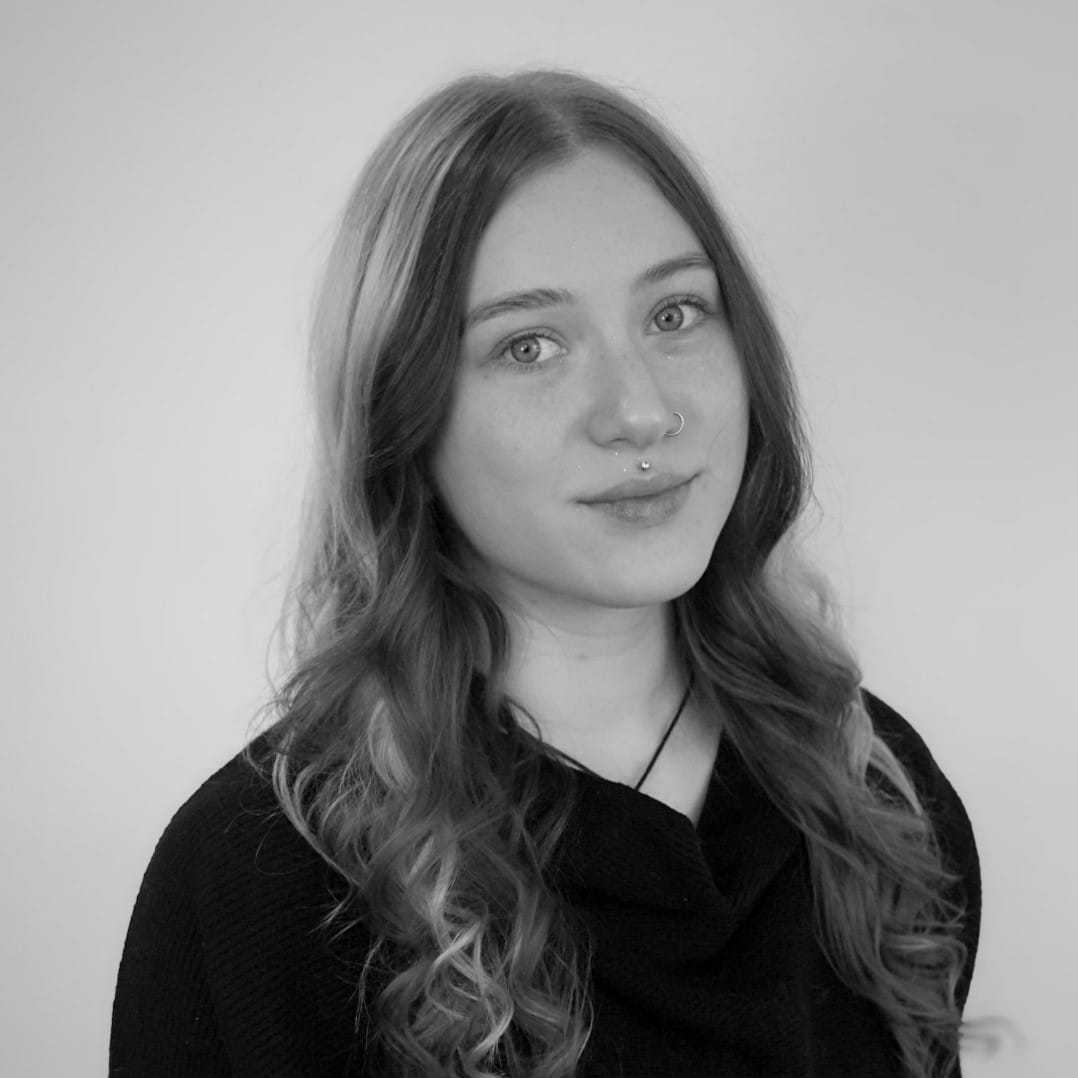 Portrait of Malina, a professional stylist at CONFETTI CROWN. a salon+spa, showcasing their expertise and style.