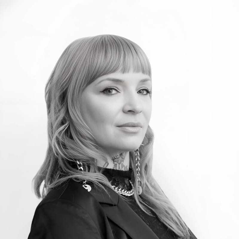 Portrait of Jocelyn, a professional stylist at CONFETTI CROWN. a salon+spa, showcasing their expertise and style.